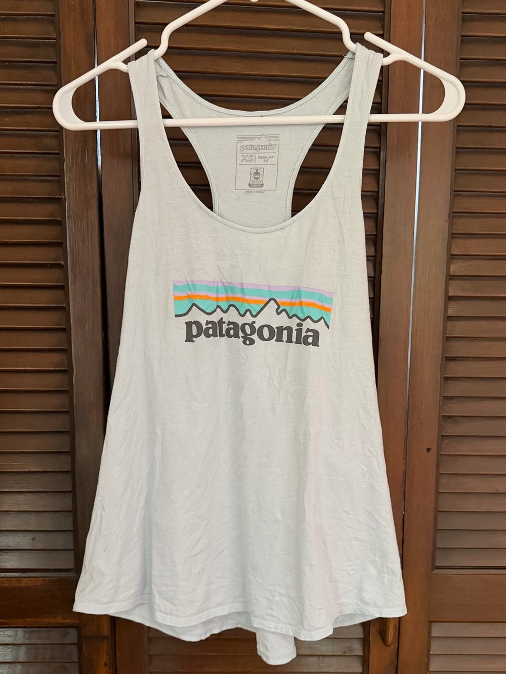 Patagonia Women’s Pale Blue Racerback Tank with Multicolor Logo
